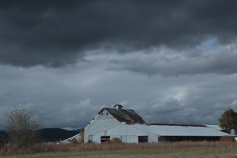 barn and clouds