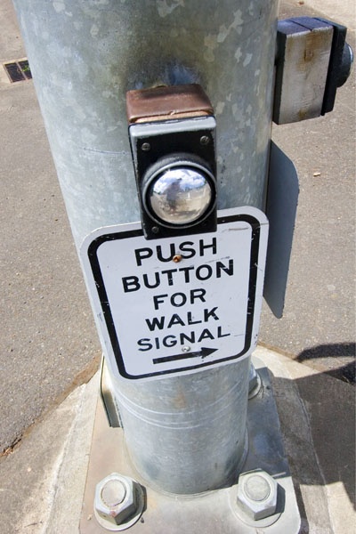 self-portrait in button